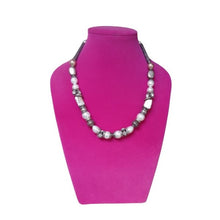 Load image into Gallery viewer, Necklace on a pink mannequin