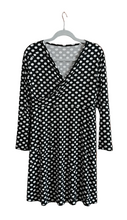 Load image into Gallery viewer, Black dress with white polkadots on a hanger