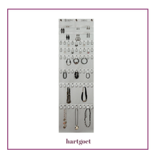 Load image into Gallery viewer, Jewelry organizer with various necklaces and earrings on a white background.