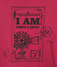 Load image into Gallery viewer, A close-up of a bright pink garment featuring a distressed black graphic print styled like a vintage postage stamp with the text 'regtig Blessed I AM THANKFUL & CONTENT' and a windmill illustration.