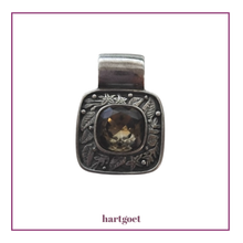 Load image into Gallery viewer, Silver pendant with a crystal on a white background.