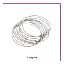 Load image into Gallery viewer, Set of 10 stretch slinky bracelets on a white background with 'hartgoet' branding.