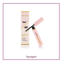 Load image into Gallery viewer, SH'ZEN Lash Grow+ Serum shown with its pink and white box and the applicator wand outside the tube, on a white background with a purple border and hartgoet watermark.