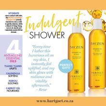 Load image into Gallery viewer, Two bottles of ShZen Perfect Endings shower oil with product info and a customer review