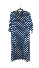 Load image into Gallery viewer, Long navy mesh jacket with white polkadots on a hanger 
