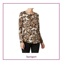 Load image into Gallery viewer, Leopard print long-sleeve top worn by a person on a white background with 'hartgoet' branding.
