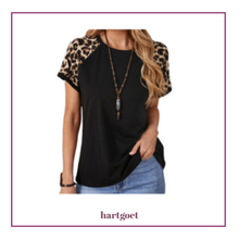 Load image into Gallery viewer, Model wearing black and leopard print T-shirt on a white background
