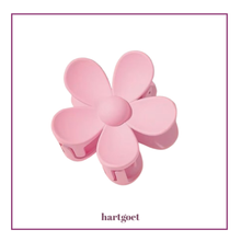 Load image into Gallery viewer, Pink flower-shaped clip on a white background.
