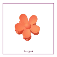 Load image into Gallery viewer, Orange flower-shaped hair clip on a white background
