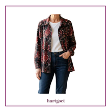 Load image into Gallery viewer, Person wearing a patterned jacket over a white shirt and jeans, with 'hartgoet' branding.
