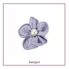 Load image into Gallery viewer, Lavender flower-shaped hair clip with a pearl center on a white background.  
