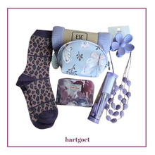 Load image into Gallery viewer, A curated gift set featuring leopard print socks, a lilac scarf, a lilac butterfly-patterned cosmetic bag, a floral card wallet, a lavender flower-shaped hair clip, a lavender bead necklace, and a mini manicure set, arranged on a white background with a purple border.

