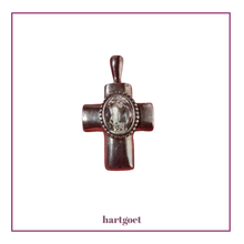Load image into Gallery viewer, Metallic cross pendant on a white background
