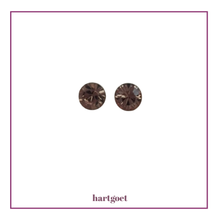 Load image into Gallery viewer, Pair of round earrings on a white background
