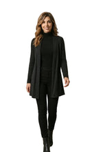 Load image into Gallery viewer, Woman wearing a black outfit in a white background 
