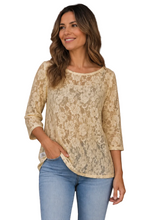 Load image into Gallery viewer, A woman wearing a yellow lace three-quarter sleeve top and light blue jeans, standing against a white background.
