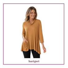 Load image into Gallery viewer, Model wearing a mustard colour top and black pants, on a white background
