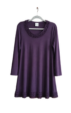 Load image into Gallery viewer, A purple long-sleeve dress with ruffled trim on the neckline and hem, hanging on a gray hanger against a plain white background.
