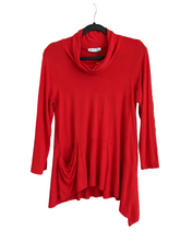 Load image into Gallery viewer, A bright red long-sleeve cowl neck top with a draped, asymmetrical hem and side pockets, hanging on a black hanger against a white background.
