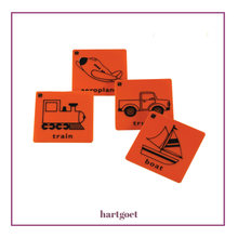 Load image into Gallery viewer, Set of orange plastic rubbing plates with black illustrations of a plane, train, truck, and boat.  
