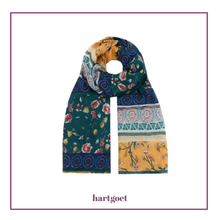 Load image into Gallery viewer, Colorful patterned scarf with 'hartgoet' branding on a white background

