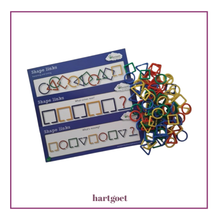 Load image into Gallery viewer, Colorful plastic shape links and activity cards on a white background
