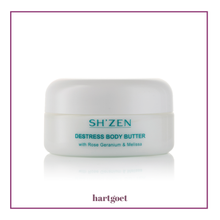 Load image into Gallery viewer, A white cosmetic jar of SH'ZEN Destress Body Butter with teal text, centered on a white background with a thin purple border and the hartgoet brand name below.
