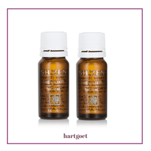 Load image into Gallery viewer, Two bottles of Sh'Zen Elixir for feet on a white background
