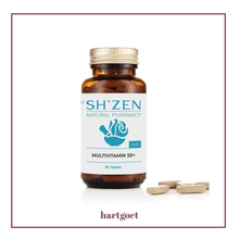 Load image into Gallery viewer, Sh'Zen multivitamin bottle with scattered tablets on a white background
