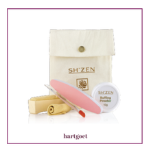 Load image into Gallery viewer, SH'ZEN nail care set with a  bag, chamois buffer, hoofstick, emery buffer and buffing powder on a white background
