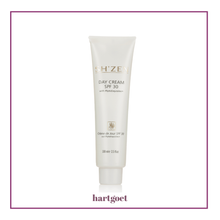 Load image into Gallery viewer, Tube of Sh'Zen Day Cream SPF 30 on a white background
