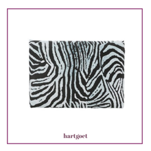 Load image into Gallery viewer, Zebra patterned coin purse with 'hartgoet' branding on a white background
