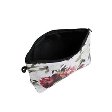 Load image into Gallery viewer, Floral-patterned pouch with black interior on a white background
