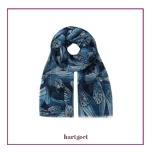 Load image into Gallery viewer, Blue patterned scarf with 'hartgoet' branding on a white background

